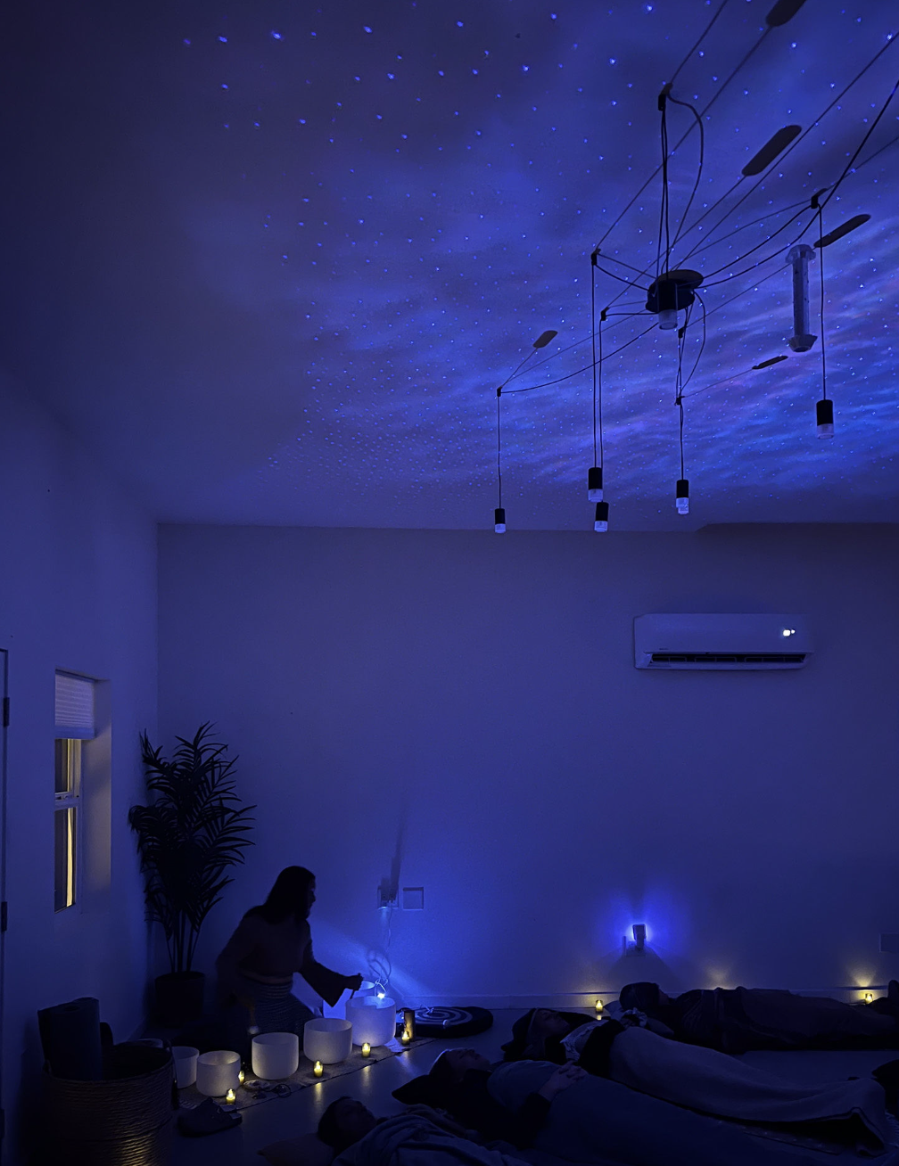 Blue starlit sound bath ceremony