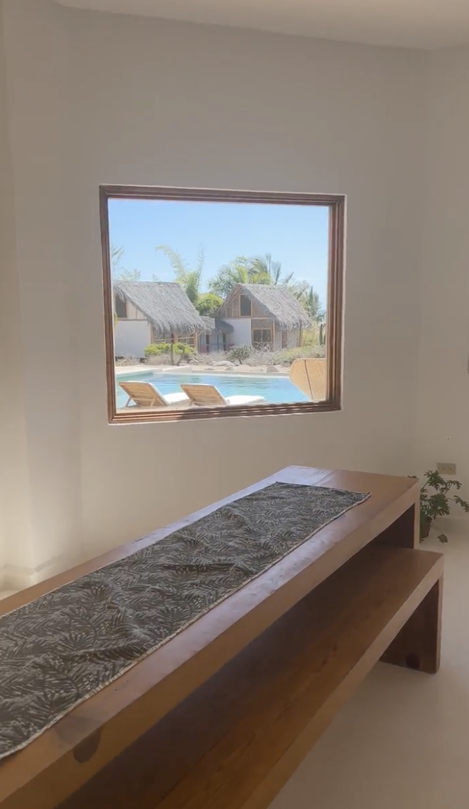 Todos Santos retreat interior with pool view